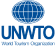 Logo premio UNWTO - Riconoscimento delle Nazioni Unite per la Leadership in Sostenibilità e l'Impegno per il Turismo Responsabile.